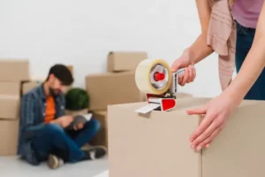 packing-boxes-with-building-tape-order-move-new-housing_23-2148095501.webp